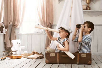Boys in the image of sailors playing in her room